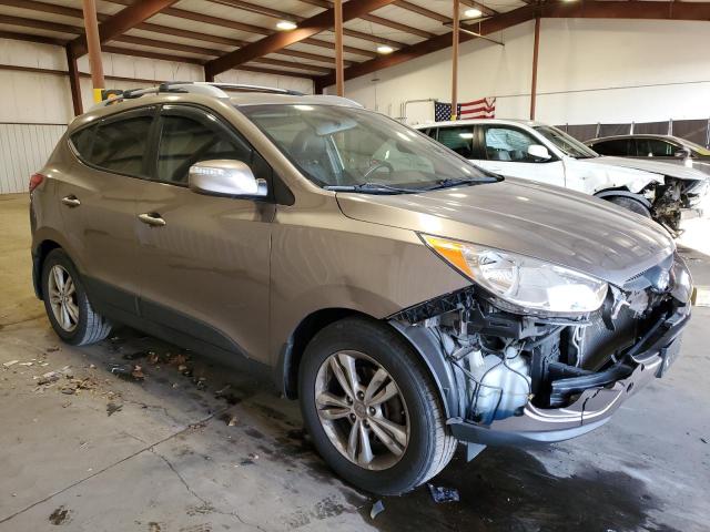 Photo 4 from auction – 2012 HYUNDAI TUCSON GLS with VIN KM8JUCAC9CU371816