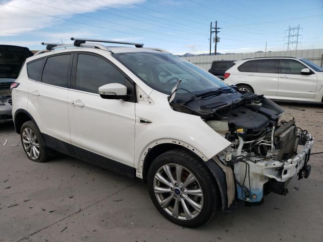 Photo 4 from auction – 2018 FORD ESCAPE TIT with VIN 1FMCU9J95JUC70494