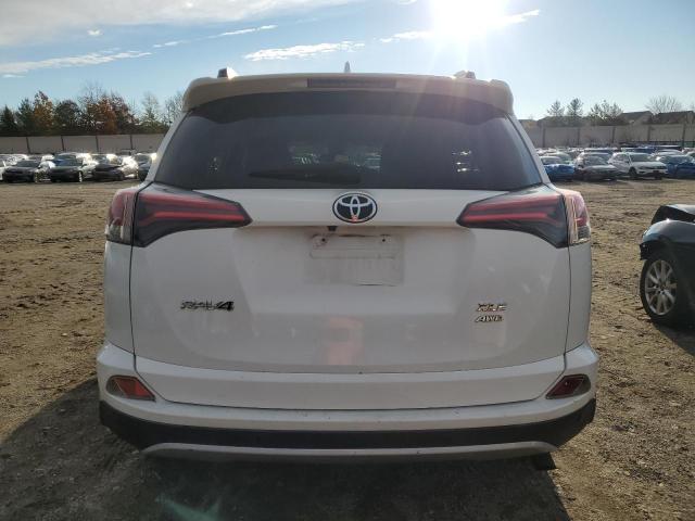 Photo 6 from auction – 2016 TOYOTA RAV4 XLE with VIN JTMRFREV0GJ067751