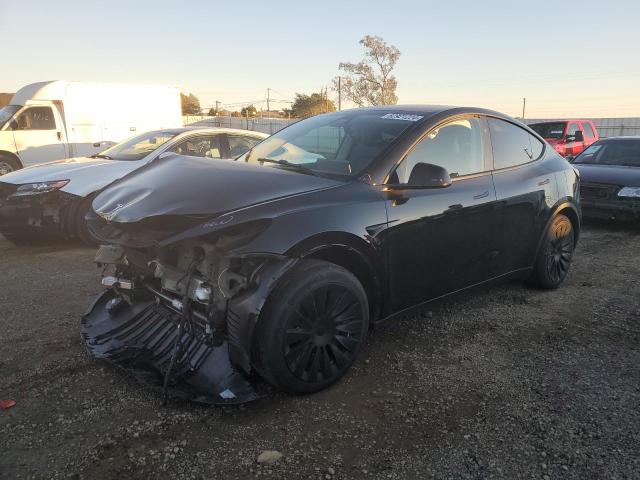 TESLA MODEL Y 2024 with VIN 7SAYGAEE4RF082504 - Photo from auction