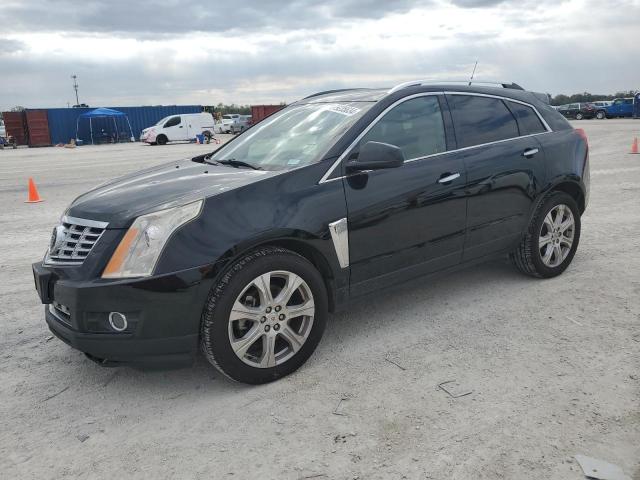 CADILLAC SRX PREMIU 2014 with VIN 3GYFNDE31ES572288 - Photo from auction