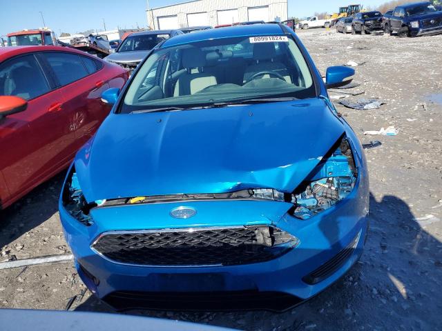 Photo 5 from auction – 2015 FORD FOCUS SE with VIN 1FADP3F23FL259439