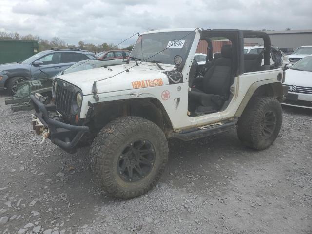 JEEP WRANGLER S 2011 with VIN 1J4AA2D12BL591296 - Photo from auction