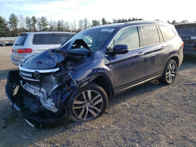HONDA PILOT TOUR 2016 with VIN 5FNYF6H97GB052728 - Photo from auction