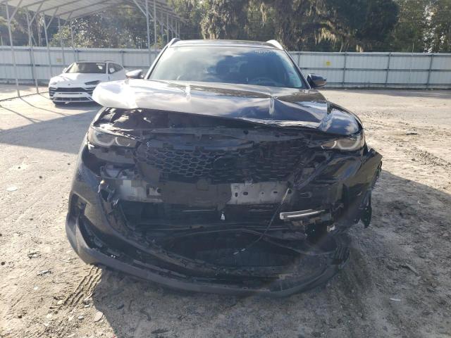 Photo 5 from auction – 2023 MAZDA CX-50 PREM with VIN 7MMVABEYXPN114520