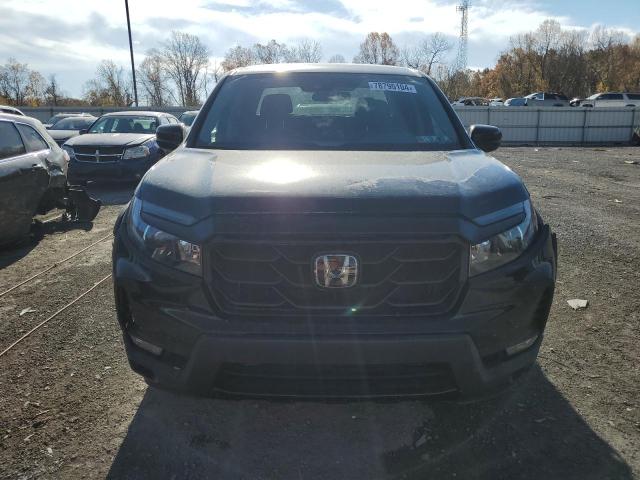 Photo 5 from auction – 2021 HONDA RIDGELINE with VIN 5FPYK3F12MB000868