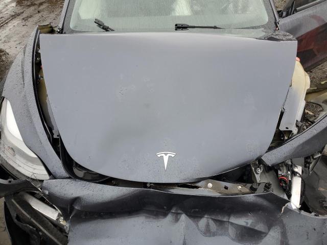 Photo 11 from auction – 2023 TESLA MODEL 3 with VIN 5YJ3E1EA7PF554427