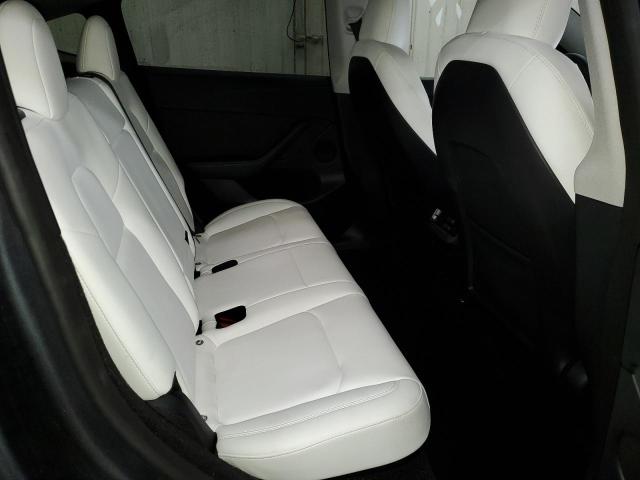 Photo 11 from auction – 2023 TESLA MODEL Y with VIN 7SAYGDEF1PF865044