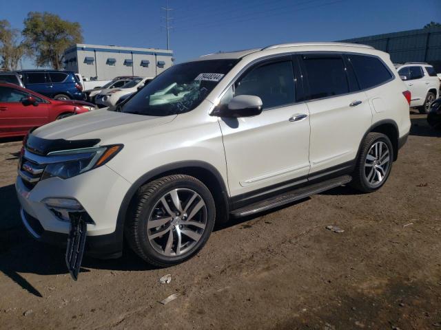 Photo 1 from auction – 2017 HONDA PILOT TOUR with VIN 5FNYF6H94HB007909