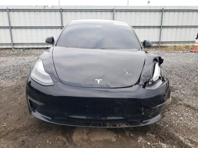 Photo 5 from auction – 2021 TESLA MODEL 3 with VIN 5YJ3E1EAXMF016073