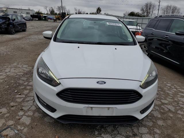 Photo 5 from auction – 2018 FORD FOCUS SE with VIN 1FADP3FE3JL223494