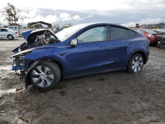 TESLA MODEL Y 2023 with VIN 7SAYGDEE5PF844110 - Photo from auction