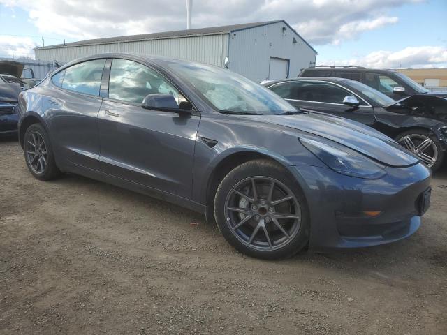 Photo 4 from auction – 2023 TESLA MODEL 3 with VIN LRW3E1FA9PC921188