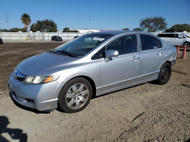 HONDA CIVIC LX 2011 with VIN 19XFA1F5XBE034800 - Photo from auction
