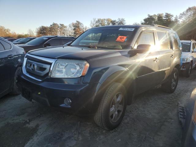 HONDA PILOT EX 2011 with VIN 5FNYF4H46BB067576 - Photo from auction