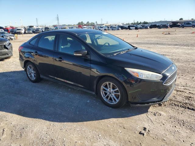 Photo 4 from auction – 2015 FORD FOCUS SE with VIN 1FADP3F20FL272911