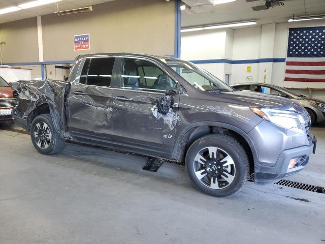 Photo 4 from auction – 2020 HONDA RIDGELINE with VIN 5FPYK3F56LB023491