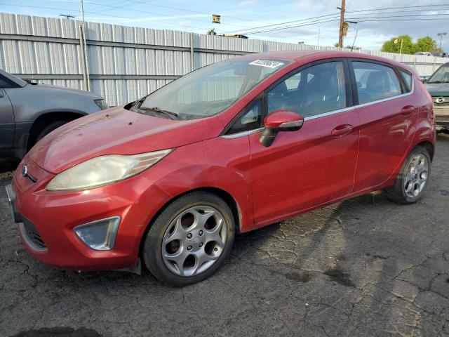 FORD FIESTA SES 2011 with VIN 3FADP4FJ8BM180726 - Photo from auction
