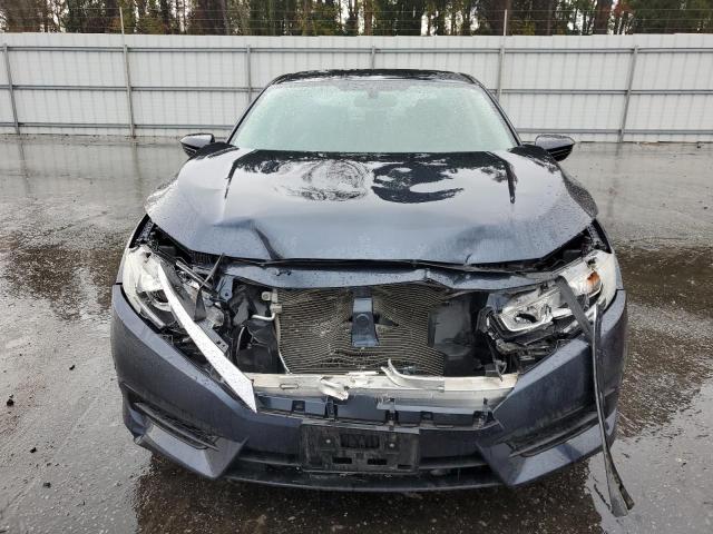 Photo 5 from auction – 2016 HONDA CIVIC LX with VIN 19XFC2F59GE005621