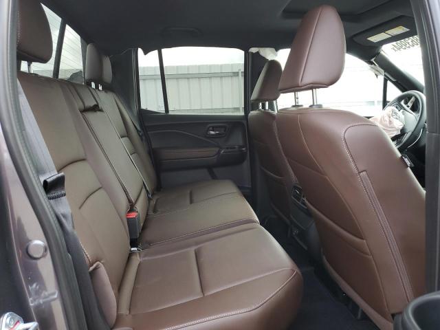 Photo 10 from auction – 2024 HONDA RIDGELINE with VIN 5FPYK3F53RB018452