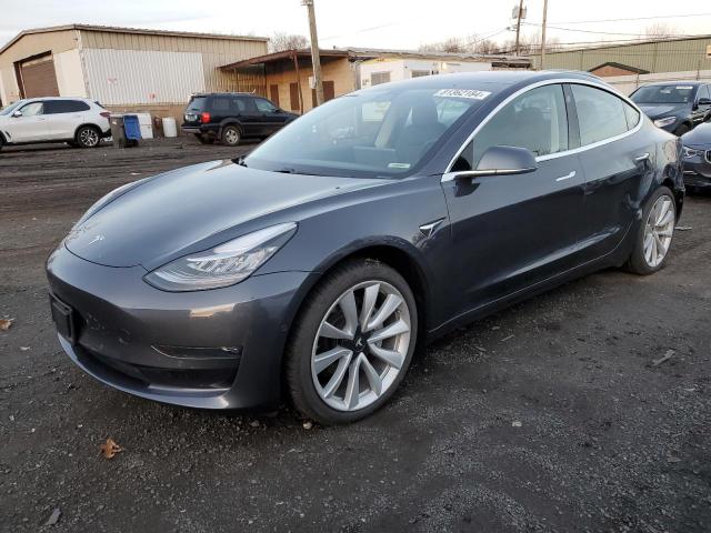 TESLA MODEL 3 2018 with VIN 5YJ3E1EA3JF033261 - Photo from auction