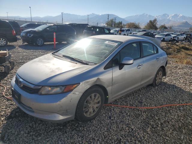 HONDA CIVIC LX 2012 with VIN JHMFB2F57CS002354 - Photo from auction