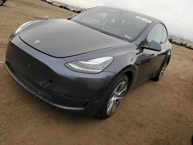 TESLA MODEL Y 2023 with VIN 7SAYGDEE3PF603615 - Photo from auction