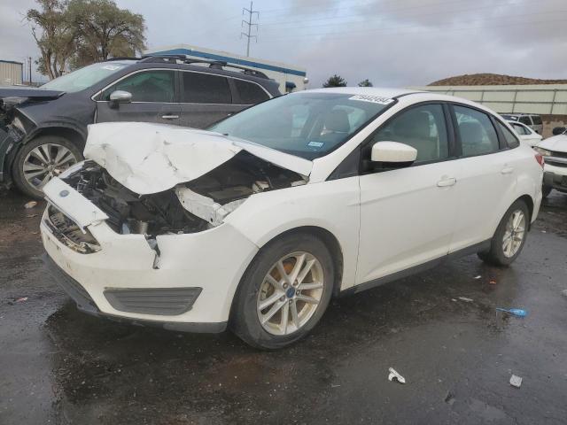 FORD FOCUS SE 2018 with VIN 1FADP3F28JL252642 - Photo from auction