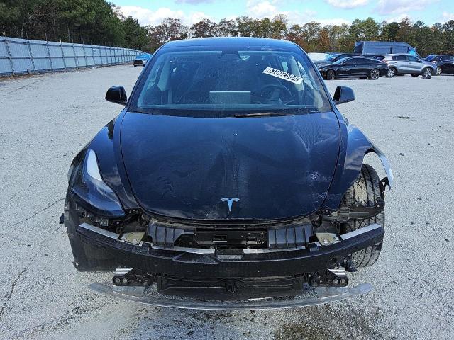 Снимка 5 от търг – 2023 TESLA MODEL 3 с VIN 5YJ3E1EA6PF435431