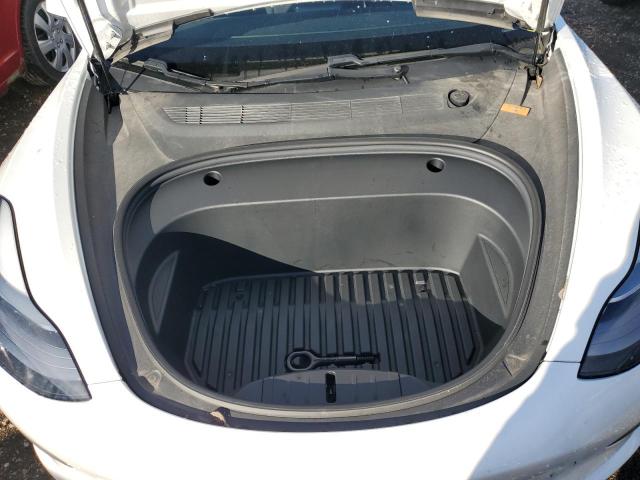 Photo 11 from auction – 2021 TESLA MODEL 3 with VIN 5YJ3E1EA4MF083526