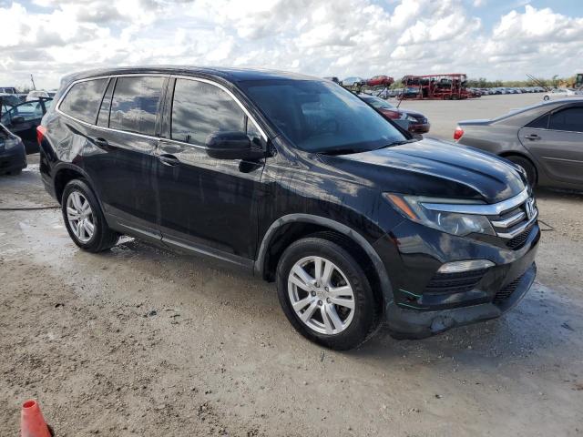 Photo 4 from auction – 2018 HONDA PILOT LX with VIN 5FNYF5H18JB032712