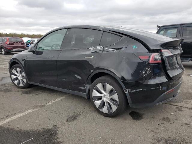 Photo 2 from auction – 2022 TESLA MODEL Y with VIN 7SAYGAEE2NF524559