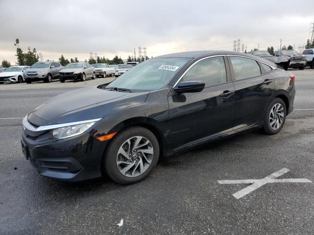 HONDA CIVIC EX 2017 with VIN 19XFC2F70HE080839 - Photo from auction