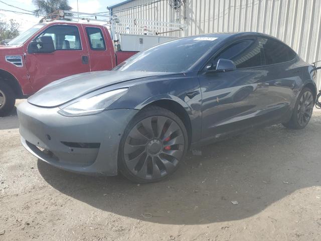 TESLA MODEL 3 2022 with VIN 5YJ3E1EC2NF127817 - Photo from auction