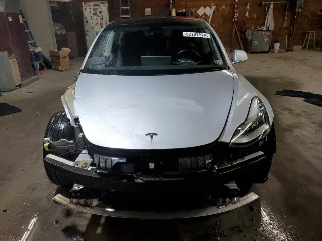 Photo 5 from auction – 2018 TESLA MODEL 3 with VIN 5YJ3E1EB5JF054475