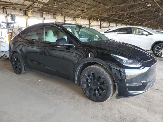 Photo 4 from auction – 2023 TESLA MODEL Y with VIN 7SAYGAEE8PF644661