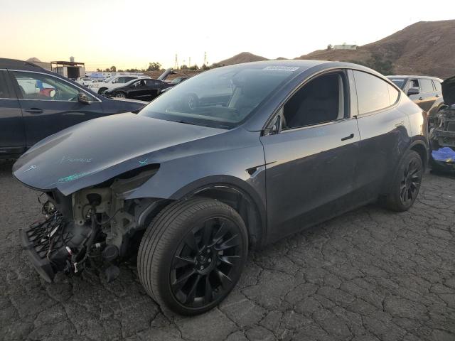 TESLA MODEL Y 2023 with VIN 7SAYGAEE8PF980052 - Photo from auction