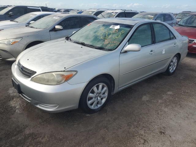 TOYOTA CAMRY LE 2002 with VIN JTDBE30K320113697 - Photo from auction