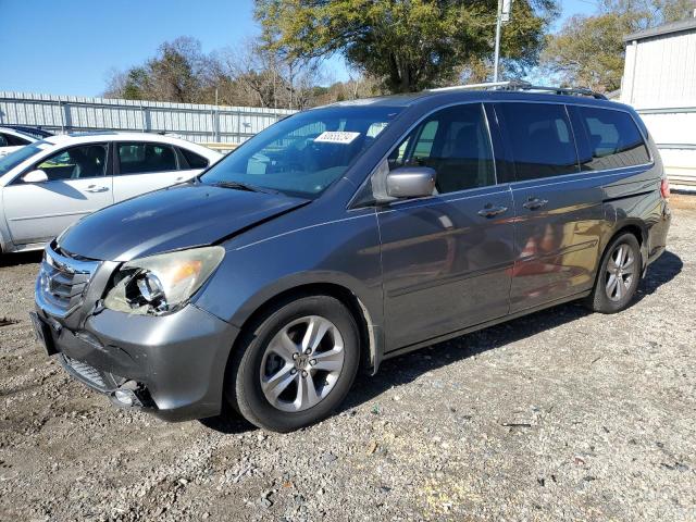 Photo 1 from auction – 2010 HONDA ODYSSEY TO with VIN 5FNRL3H96AB025698