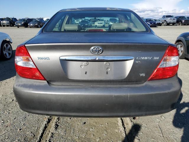Photo 6 from auction – 2002 TOYOTA CAMRY LE with VIN JTDBF30K520003957