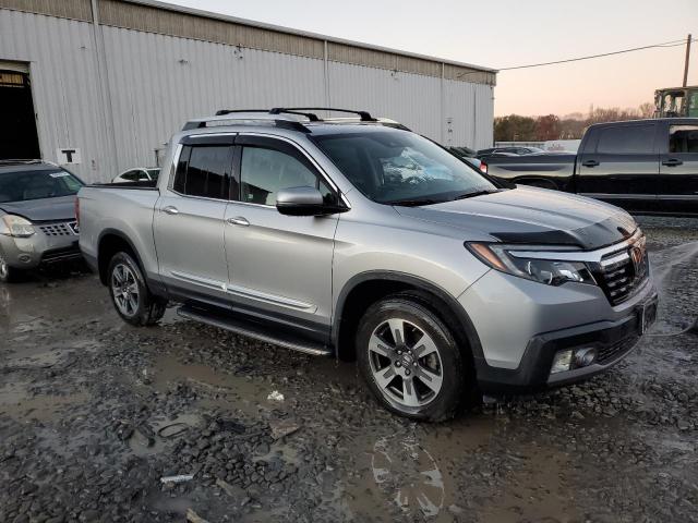 Photo 4 from auction – 2018 HONDA RIDGELINE with VIN 5FPYK3F70JB002490