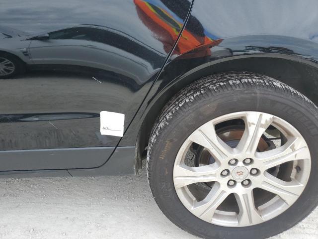 Photo 13 from auction – 2014 CADILLAC SRX PREMIU with VIN 3GYFNDE31ES572288