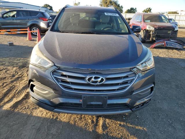 Photo 5 from auction – 2017 HYUNDAI SANTA FE S with VIN 5NMZU3LB3HH012214
