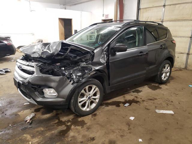 FORD ESCAPE SE 2018 with VIN 1FMCU9GDXJUC08472 - Photo from auction