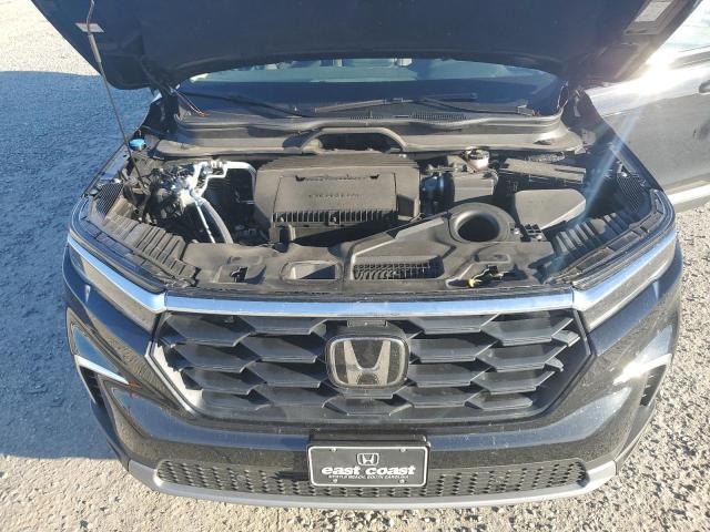 Photo 12 from auction – 2025 HONDA PILOT EXL with VIN 5FNYG2H48SB006313