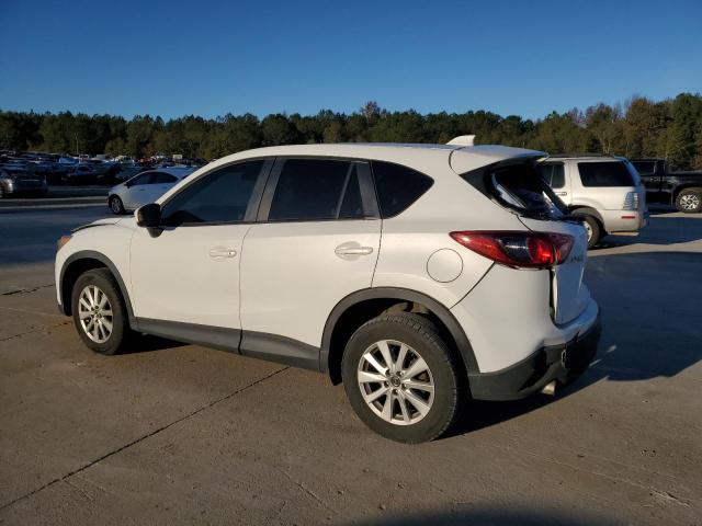 Photo 2 from auction – 2014 MAZDA CX-5 TOURI with VIN JM3KE2CY6E0310529
