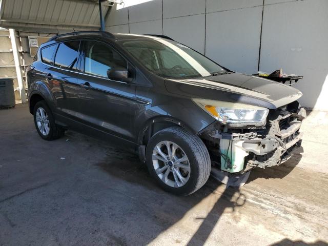 Photo 4 from auction – 2018 FORD ESCAPE SE with VIN 1FMCU9GD5JUA20622