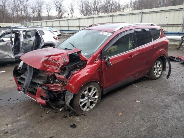 FORD ESCAPE TIT 2016 with VIN 1FMCU9J9XGUC75733 - Photo from auction