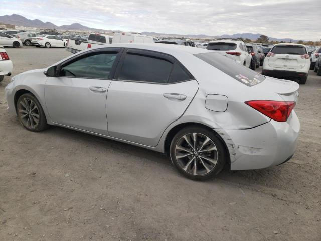 Photo 2 from auction – 2018 TOYOTA COROLLA L with VIN 2T1BURHE2JC061746