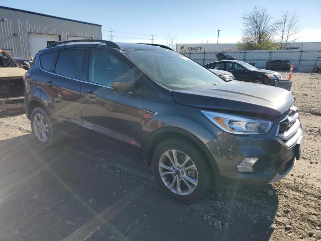 Photo 4 from auction – 2018 FORD ESCAPE SE with VIN 1FMCU9GD6JUC63078